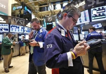Giới đầu tư Phố Wall đang hướng sự chú ý vào cuộc họp sắp tới của FED - Ảnh: Reuters